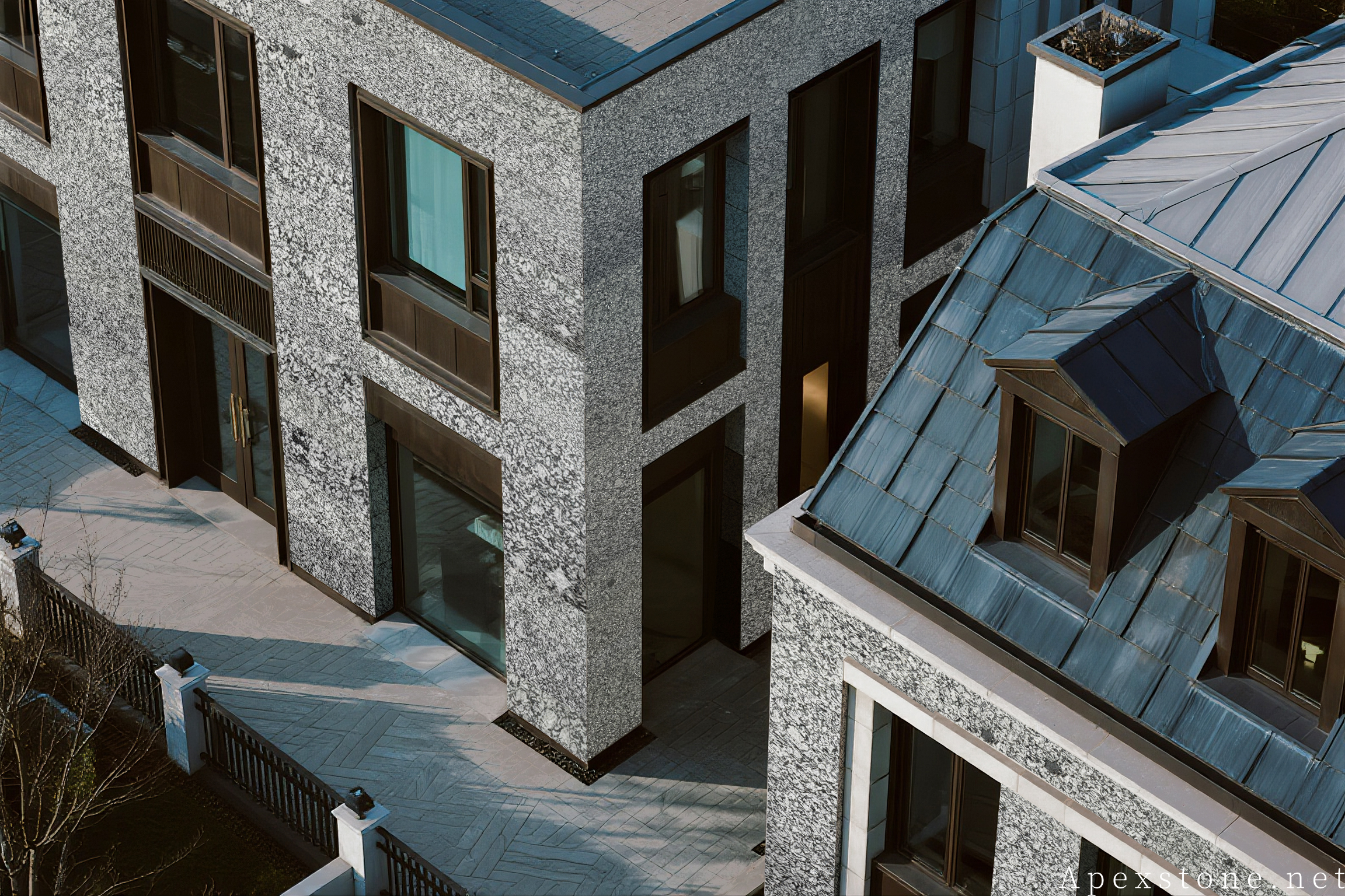 Sea Wave Granite - exterior wall claddings Modern villas fully clad in Sea Wave granite exterior wall panels, aerial view