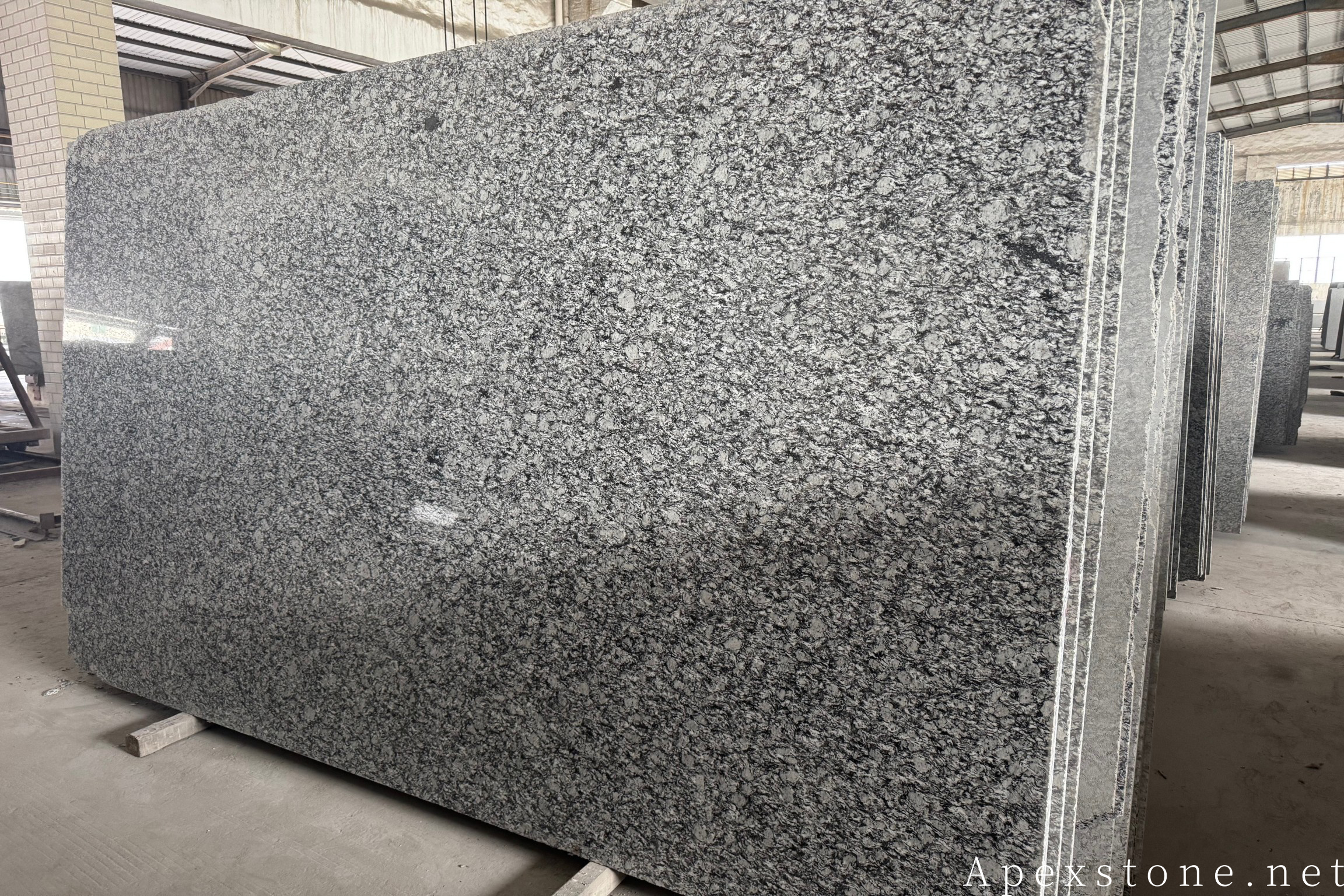Sea Wave granite slabs stocked in the workshop for landscaping orders