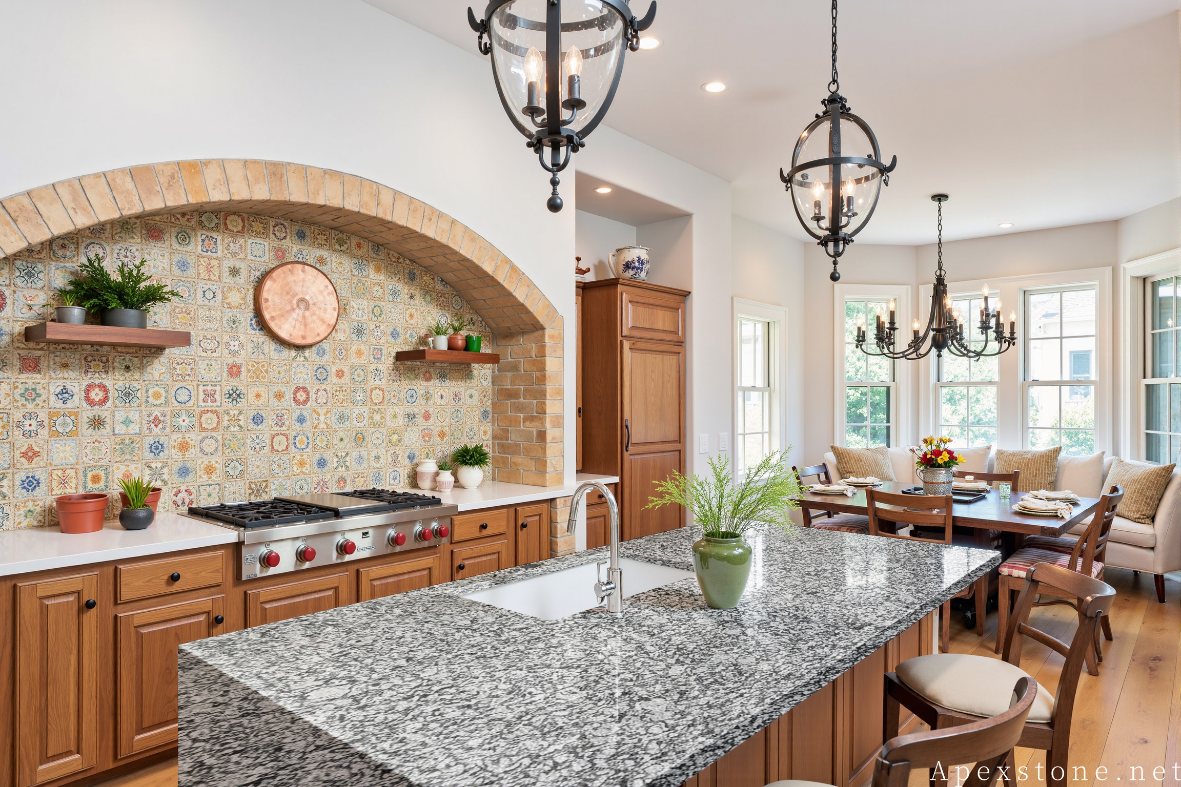 Traditional kitchen with Sea Wave granite island and dining area