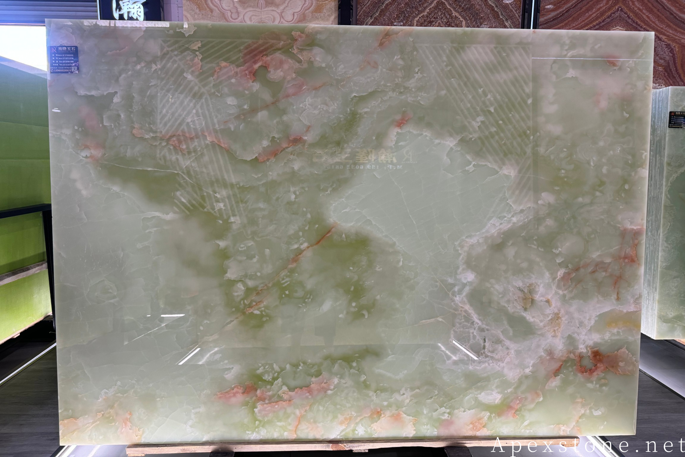Green Onyx slabs with layered translucent bands of green and white